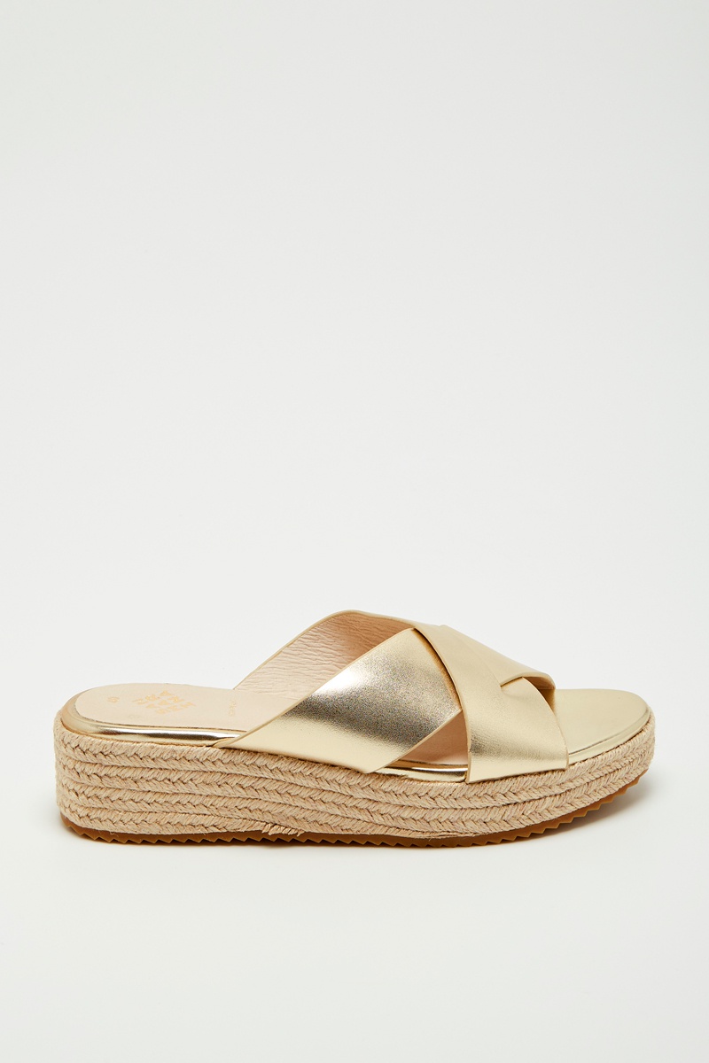 Mules compensées en cuir Guada Doré